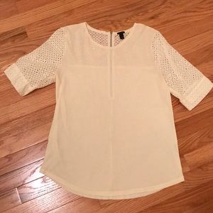 Sweet off-white J. Crew top with eyelet detailing.